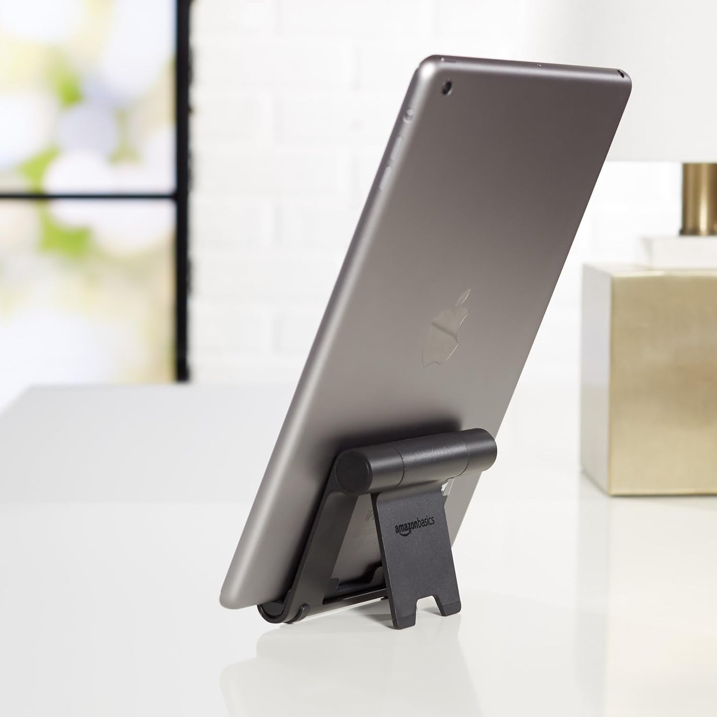 Amazon Basics Multi-Angle Portable Foldable Stand for iPad Tablet, E-reader and Phone, Sturdy Hands-Free Viewing, Black