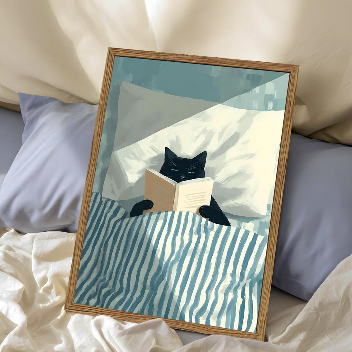 Framed Funny Black Cat Wall Art, Whimsical Cat in Stripe Bed Reading Wall Decor Painting Cute Animal Book Lover Blue and White Poster Canvas Print for Bedroom Living Room 16x24 inch Wood Framed