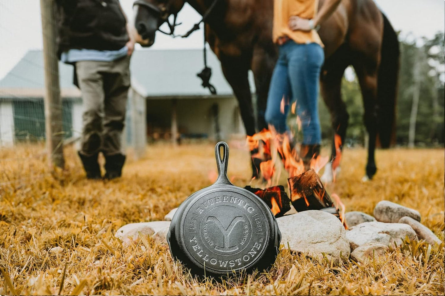 Lodge Pre-Seasoned Yellowstone Stamped Cast Iron Cookware - Signature Teardrop Handle - Use in the Oven, on the Stove, on the Grill, or Over a Campfire - 10.25 Inch Logo Skillet