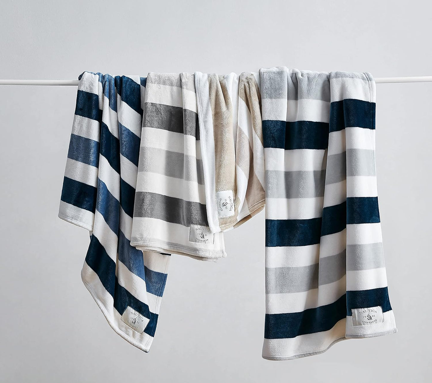 Nautica - Throw Blanket, Super Soft & Cozy Fleece Blanket, Lightweight Plush Bedding for Couch & Bed (Awning Stripe Navy, 50' x 60')