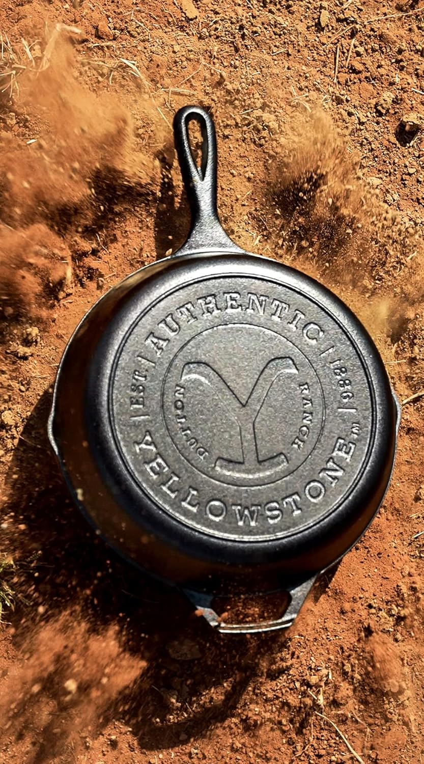 Lodge Pre-Seasoned Yellowstone Stamped Cast Iron Cookware - Signature Teardrop Handle - Use in the Oven, on the Stove, on the Grill, or Over a Campfire - 10.25 Inch Logo Skillet