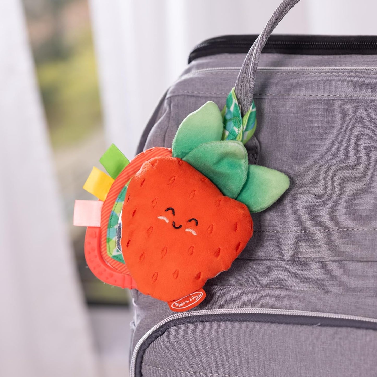 Melissa & Doug Peek-a-Boo Berry Take-Along Toy with Teether, Clip-On Stroller Toy for Baby Ages 12m+