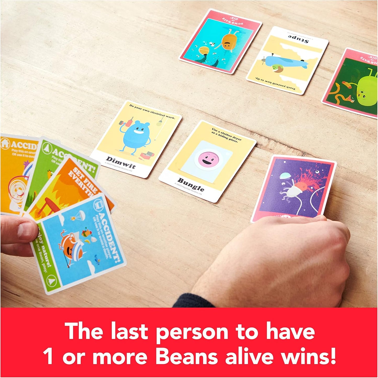 Spin Master Games, Dumb Ways to Die, The Viral Meme Card Game from YouTube and TikTok, Survival Strategy Fun, 2-5 Players, Easter Gift, for Ages 12 & Up